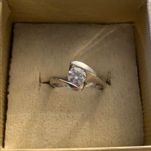 Moissanite Fire .80ct   bypass solitaire ring